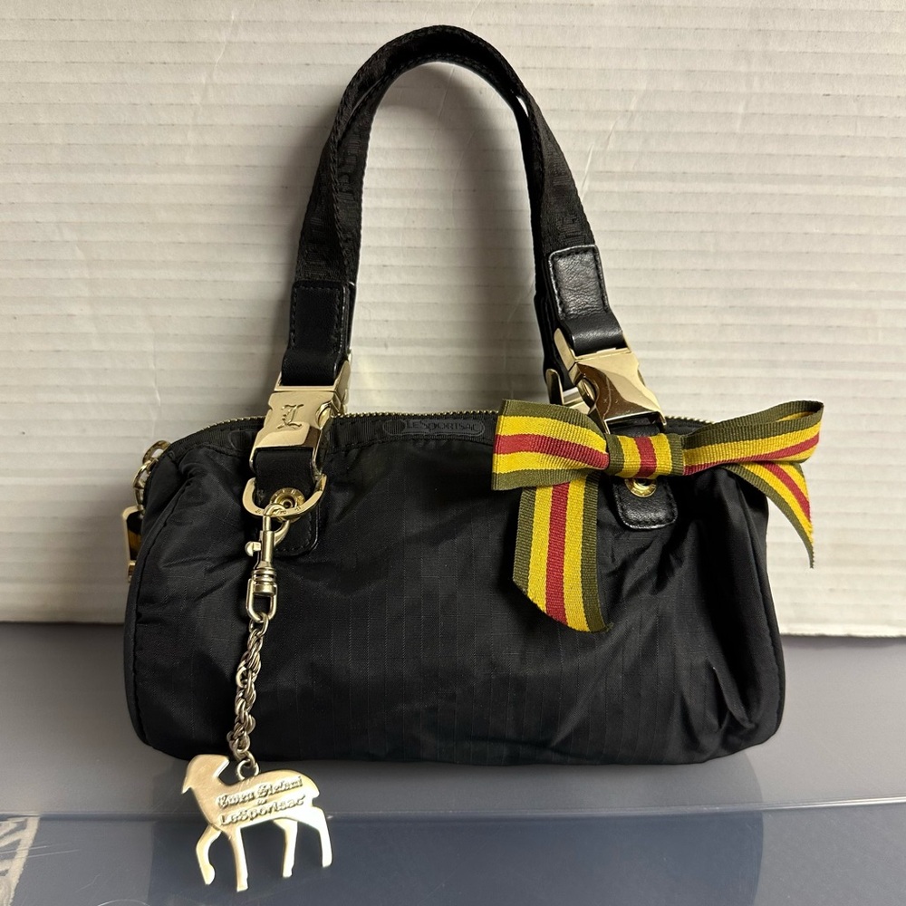 L.A.M.B. X LeSportsac Gwen Stefani LAMB Black Rasta Mini Barrel Bag